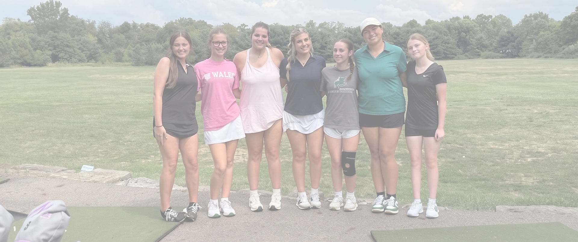 Group of golfers at 12th St Driving Range
