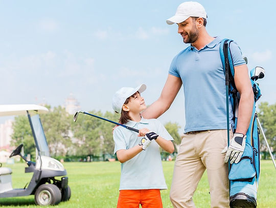 Father and child practicing golf with a cart